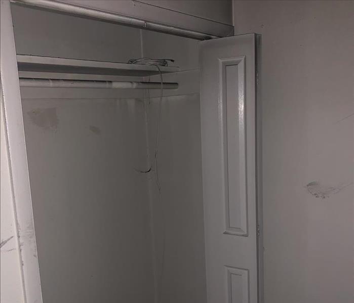 Soot damage inside of a closet