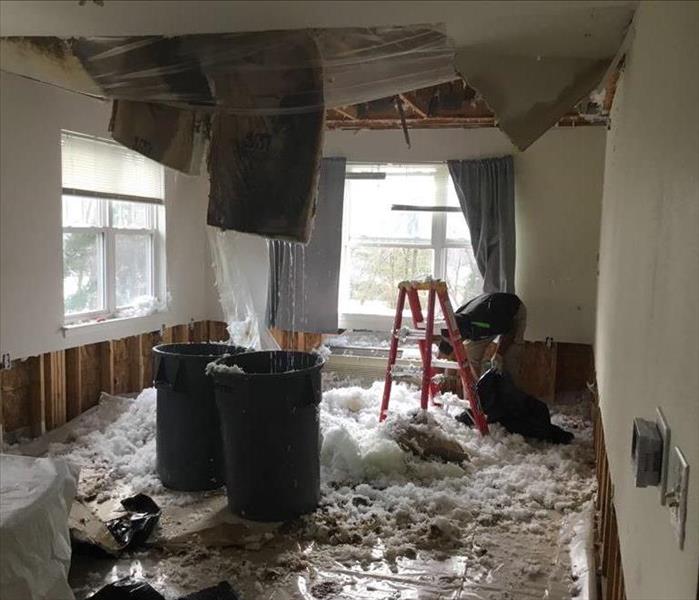 A water damaged ceiling in a rockville apartment