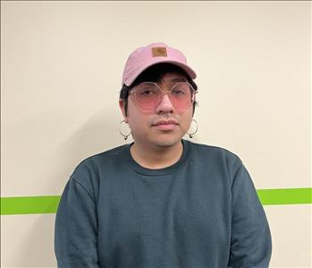 servpro employee with pink cap
